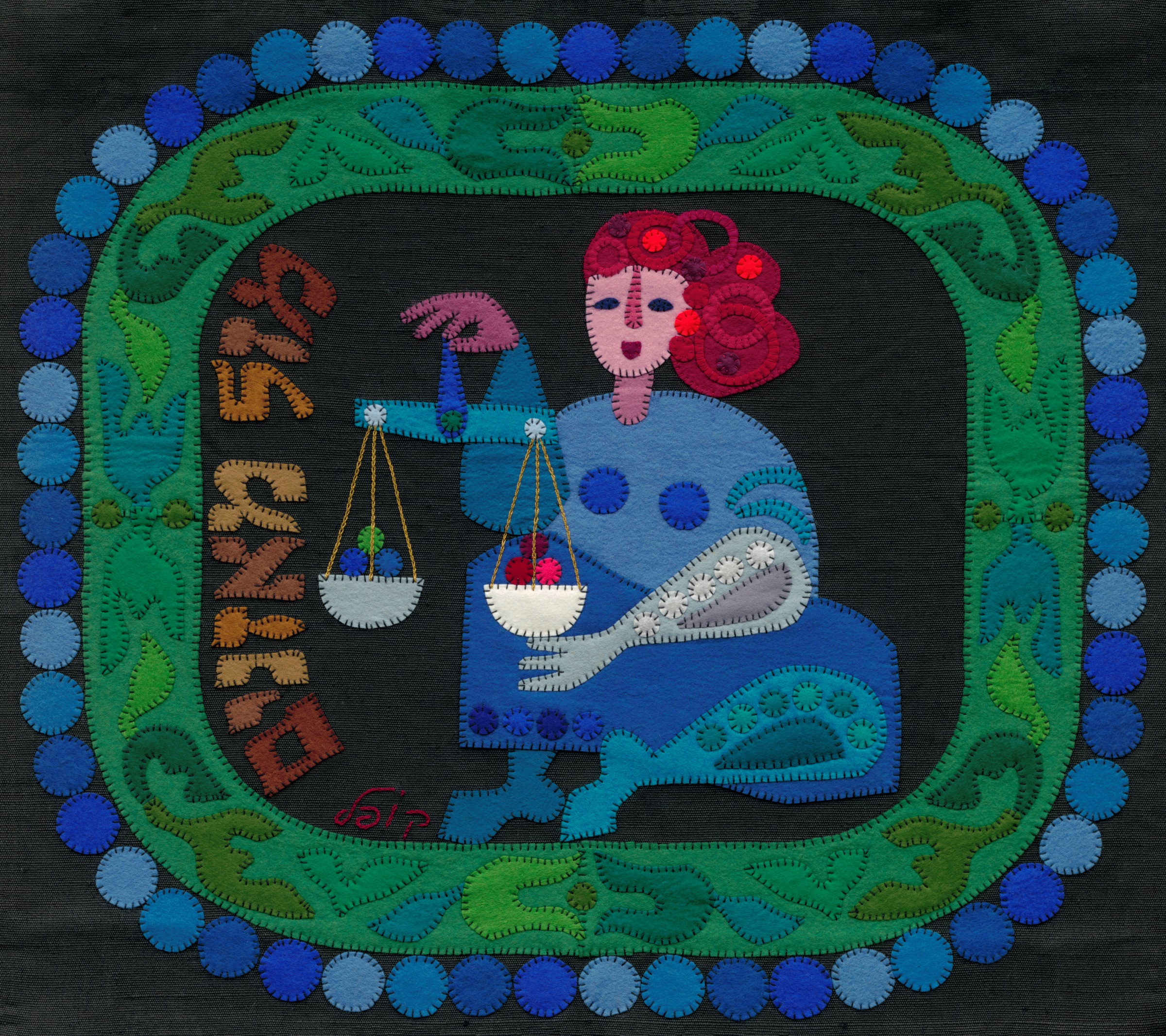 Libra by Kopel Gurwin, a hand-cut felt appliqué depicting a seated woman holding a balance scale with two suspended white pans. The figure, dressed in shades of blue and turquoise with vivid red hair, is set against a black background within an ornate green and turquoise border edged with blue circles. Hebrew lettering identifies the sign as Mazal Moznaim.